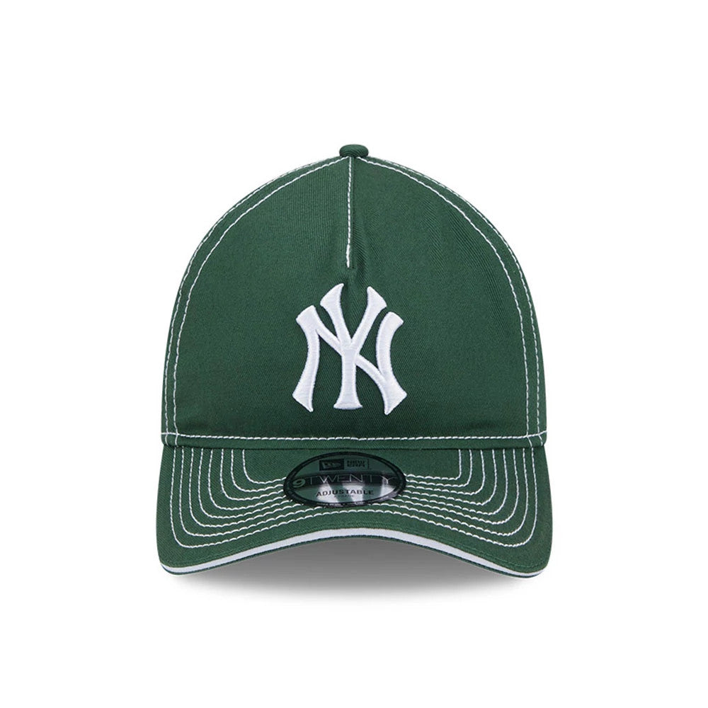 New York Yankees MLB Contrast Dark Green New Era 9TWENTY A-Frame Adjustable Cap, front view showing a white raised embroidered Yankees logo on the structured dark green crown with contrasting white stitching and a 9TWENTY size sticker on the visor.