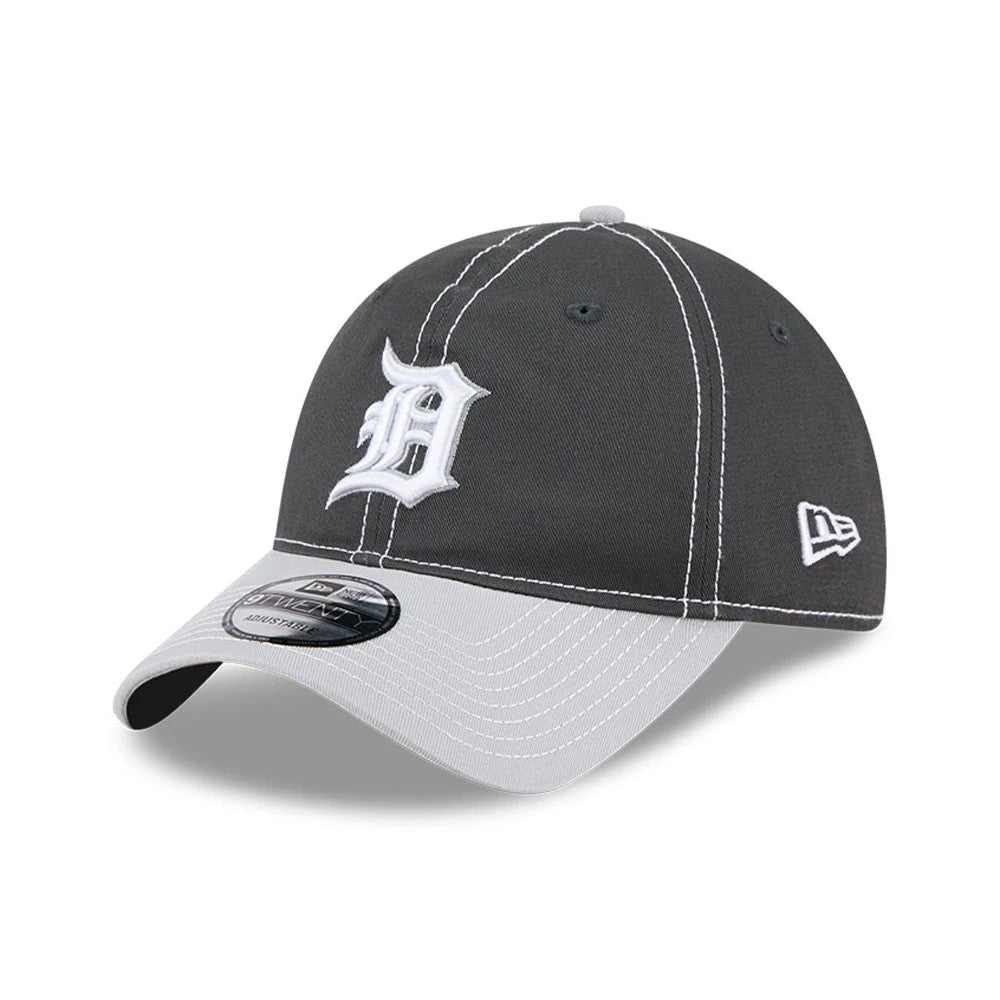 Detroit Tigers MLB 2Tone Charcoal New Era 9TWENTY Adjustable Cap, three-quarter view showing the raised white embroidered Tigers logo on the front panel, grey curved visor with a 9TWENTY size sticker, and New Era flag logo on the left side.