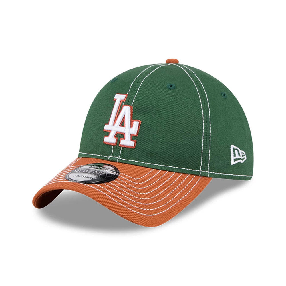 LA Dodgers MLB 2Tone Dark Green New Era 9TWENTY Adjustable Cap, three-quarter view with a raised white LA logo on the structured front panels, a brown curved visor with white stitching, and a 9TWENTY size sticker.