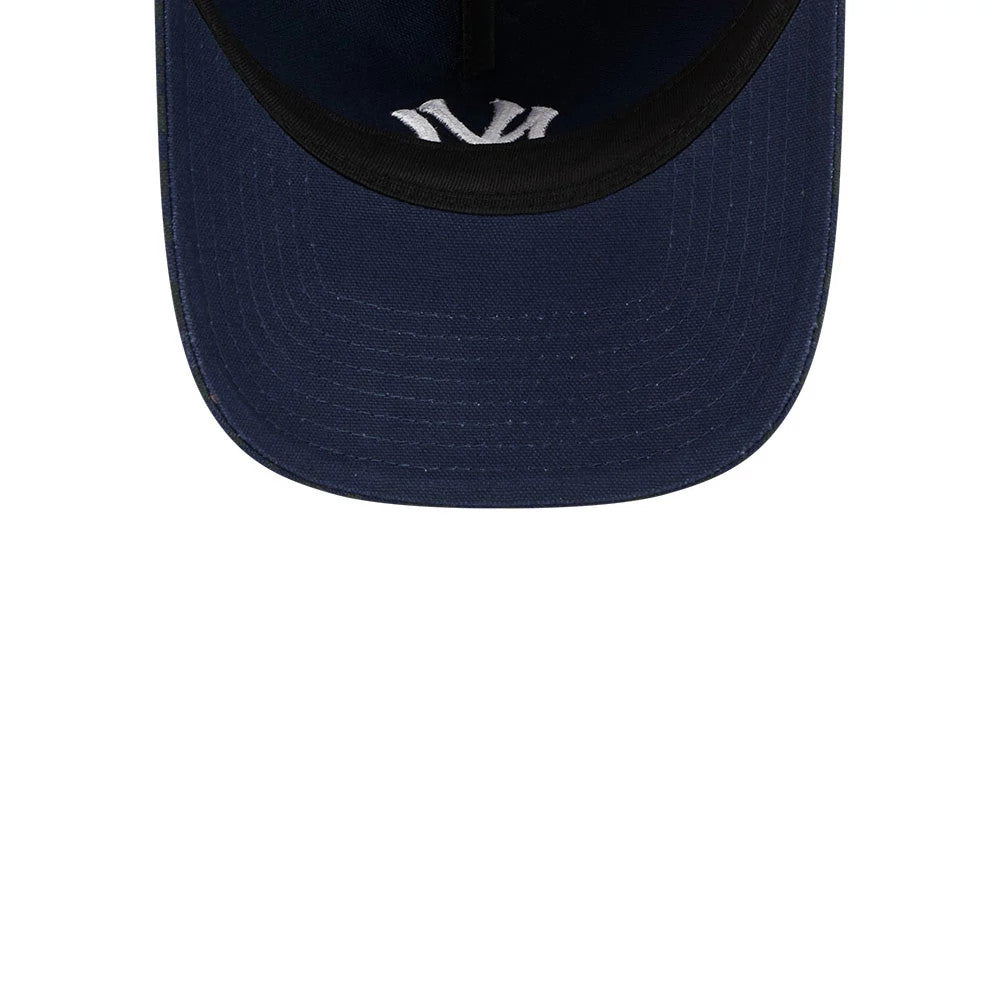 New York Yankees MLB Leopard Dark Blue New Era 9TWENTY A-Frame Adjustable Cap, inside view showing the navy undervisor with a black edge, white embroidered NY logo on the sweatband, and black taping across the crown interior.