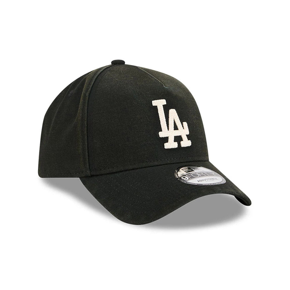 LA Dodgers MLB Washed Canvas Black New Era 9FORTY A-Frame Adjustable Cap, three-quarter view showing the white embroidered LA logo on the front panel, black curved visor with a 9FORTY size sticker.