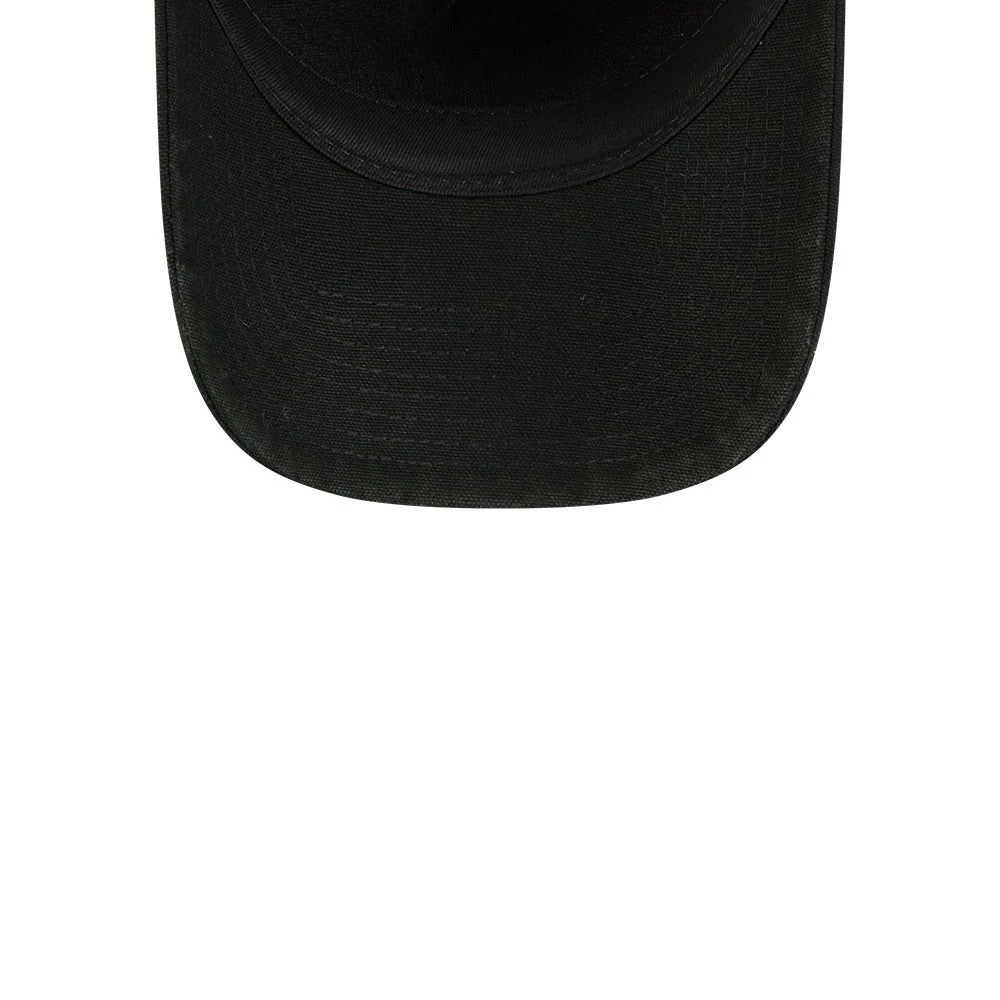 New York Yankees MLB Washed Canvas Black New Era 9FORTY A-Frame Adjustable Cap, underside view showing the black canvas material of the visor with a textured pattern across the surface.