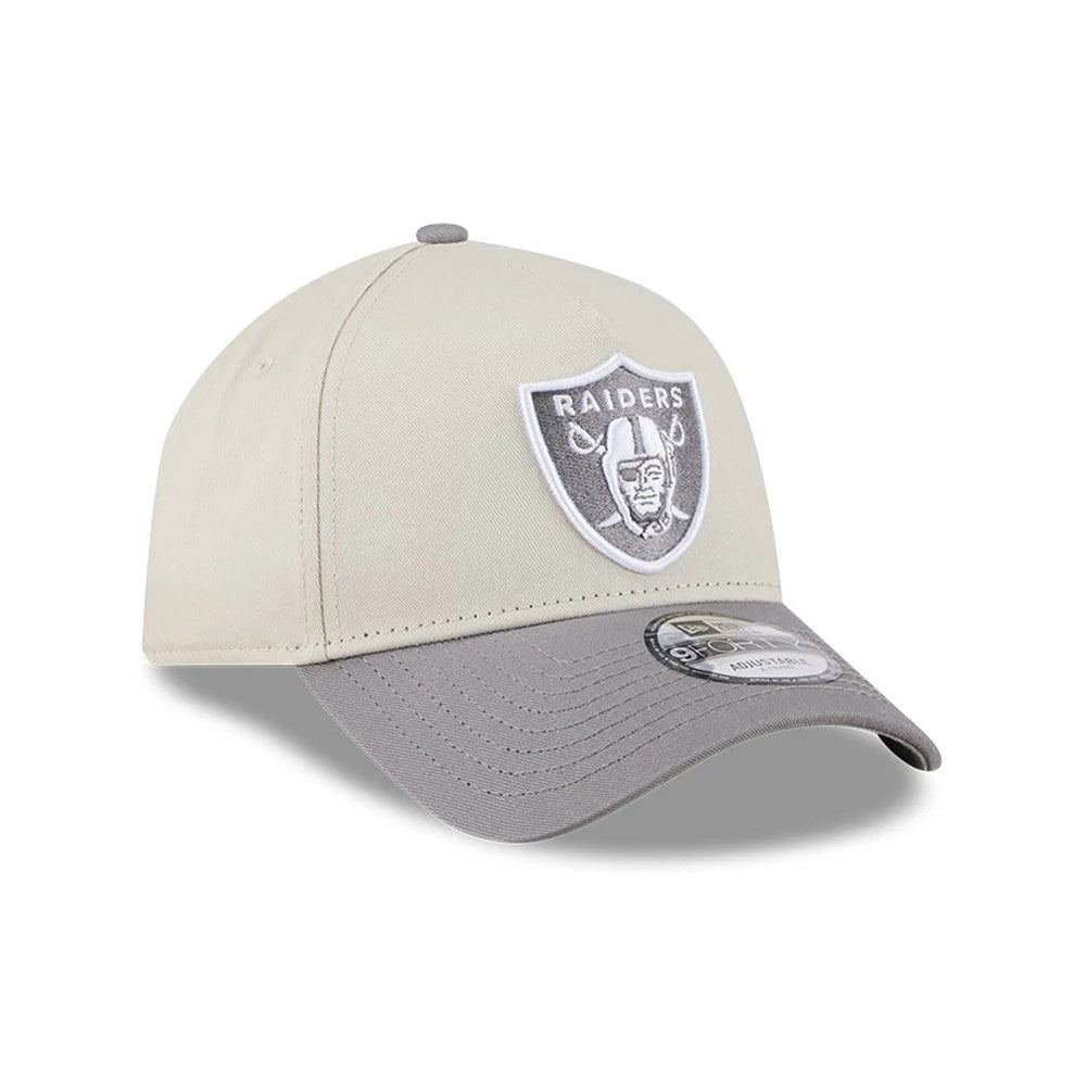 Las Vegas Raiders NFL Stone Storm Light Beige New Era 9FORTY A-Frame Adjustable Cap, three-quarter view with a white and grey embroidered Raiders logo on the front panel, curved light grey visor and 9FORTY size sticker.