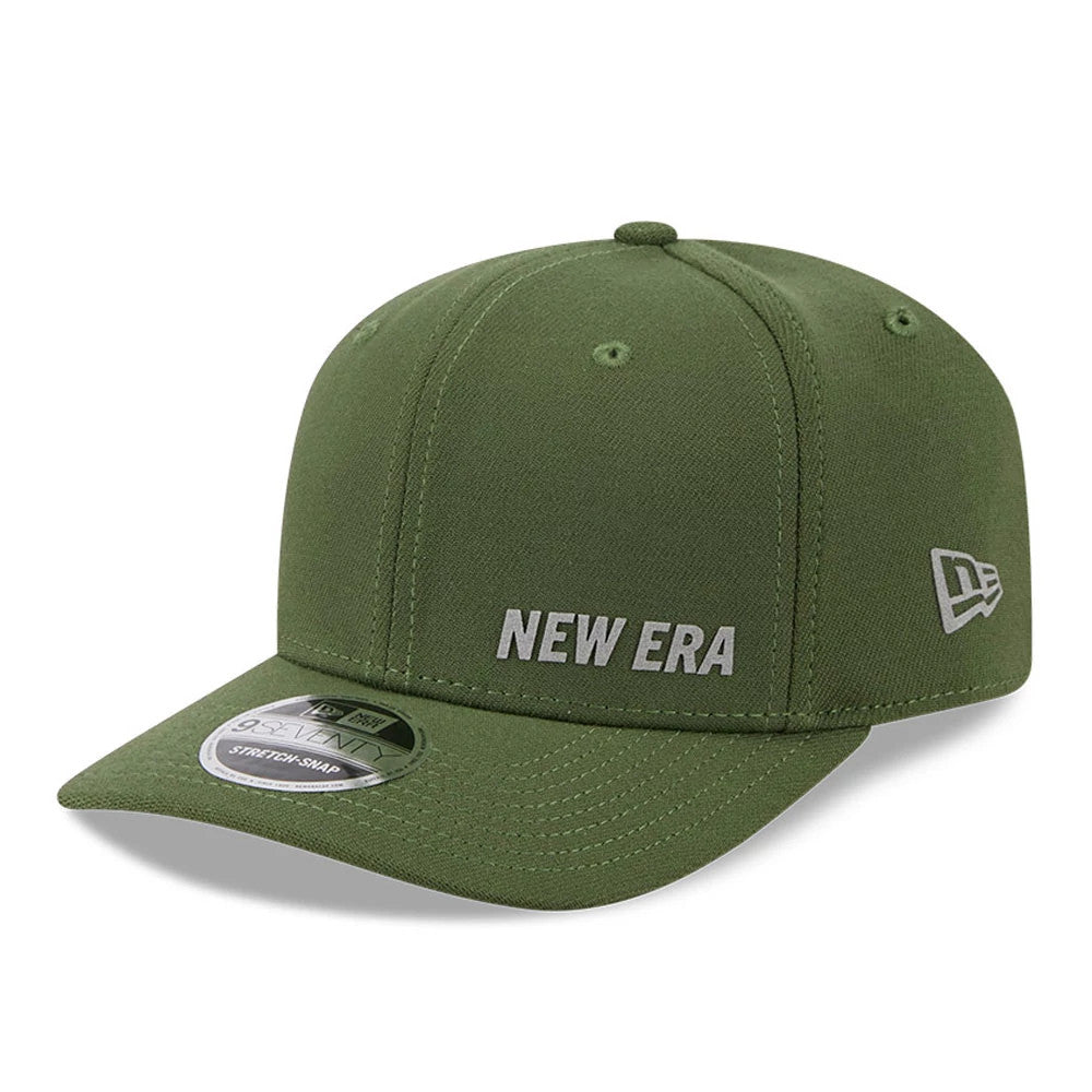 New Era Flawless Dark Green 9SEVENTY Stretch Snap Adjustable Cap, three-quarter view showing the white embroidered New Era wordmark on the front panel, matching dark green visor with a 9SEVENTY size sticker.