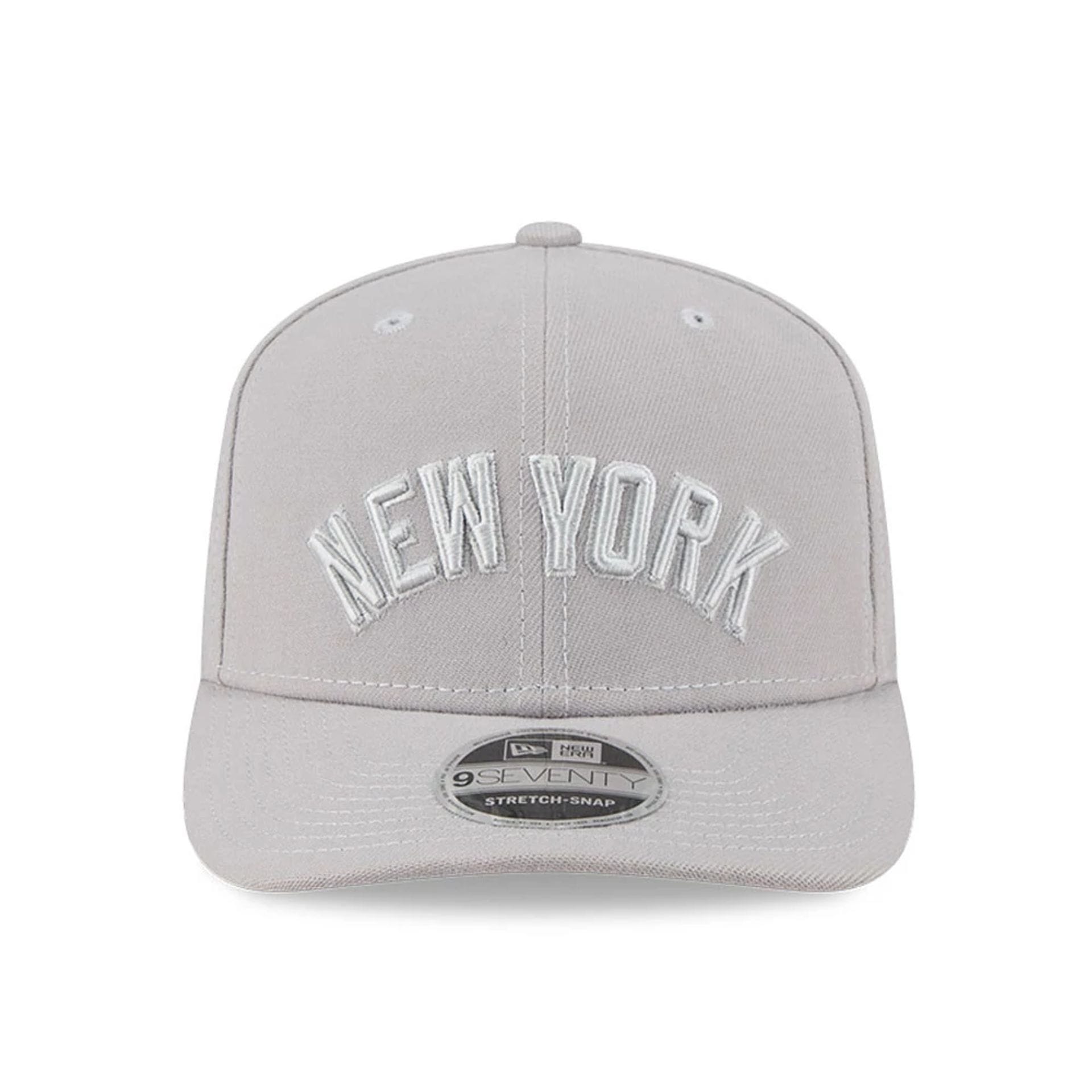 Pictured is this MLB Script New York Yankees 9SEVENTY Stretch Snap cap in grey. 2