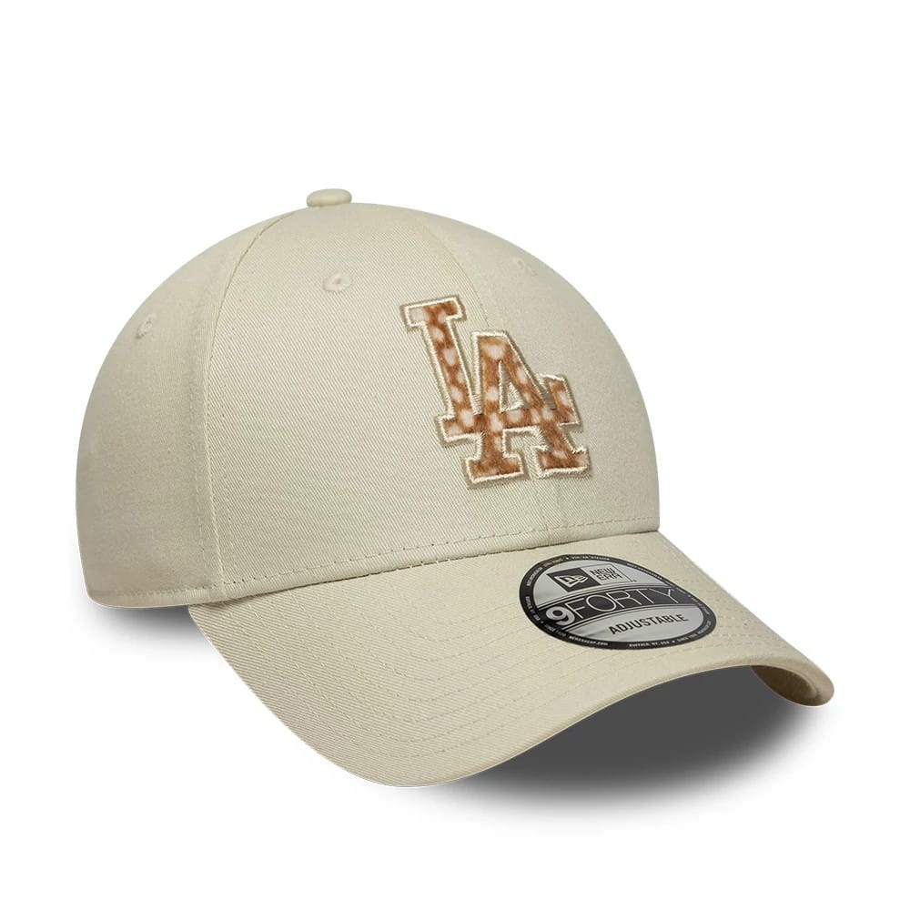 LA Dodgers Animal Print Cream New Era 9FORTY Adjustable Cap, three-quarter view showing a cream cap with raised LA logo in a brown animal print on the front panel, a curved cream visor, and a 9FORTY size sticker on the visor.
