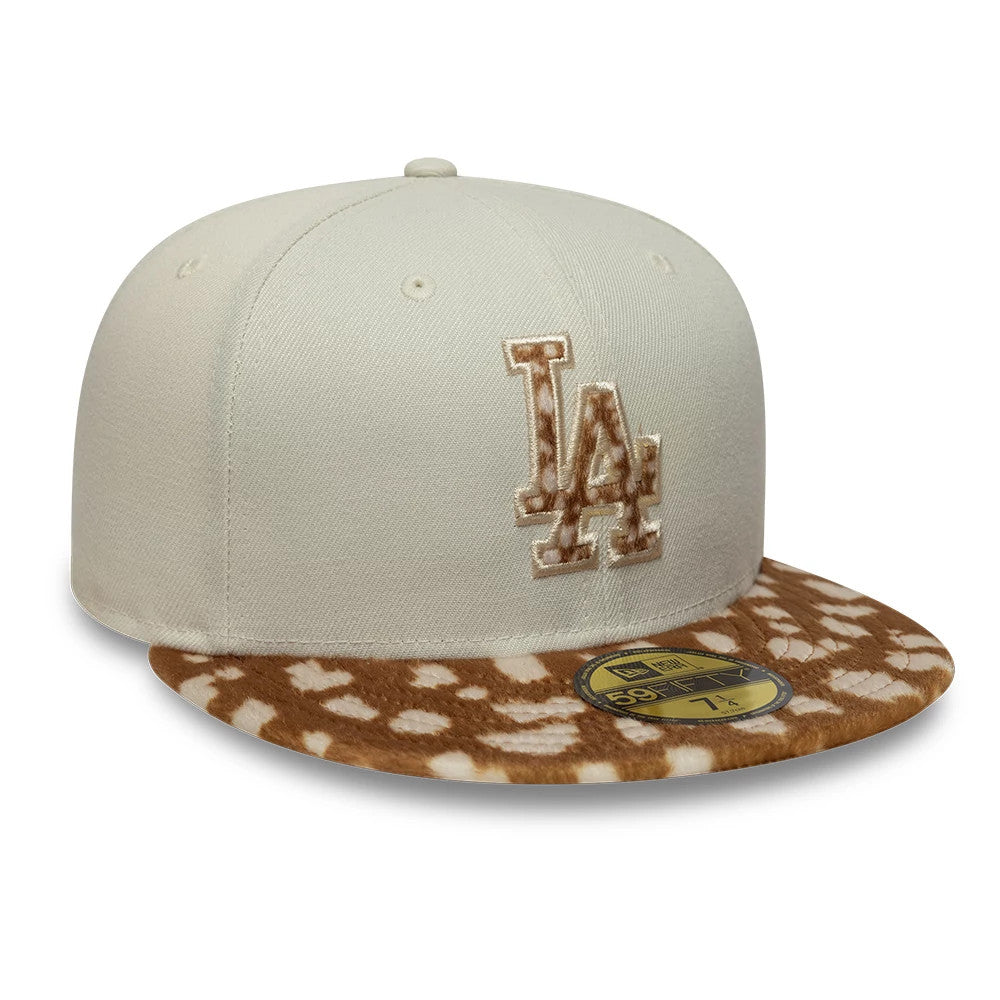 LA Dodgers Animal Print Beige New Era 59FIFTY Fitted Cap, three-quarter view showing the beige embroidered LA logo on the front panel, paired with an animal print visor and a gold 59FIFTY size sticker.