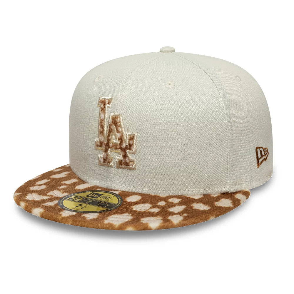 LA Dodgers Animal Print Beige New Era 59FIFTY Fitted Cap, three-quarter view showing the raised beige and brown embroidered LA logo on the front panel, an animal print visor and a gold 59FIFTY size sticker on the flat visor.