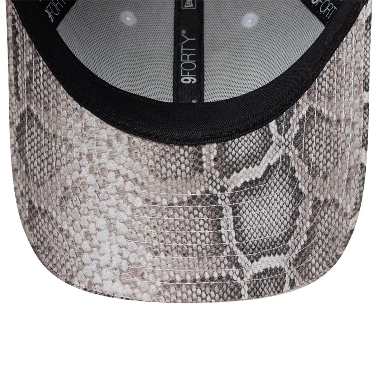 Womens New Era X Barbara Bui Python All Over Print 9FORTY Adjustable Cap, inside view showing grey taping with repeated 9FORTY branding, a black sweatband, and the all-over python print covering the entire visor.