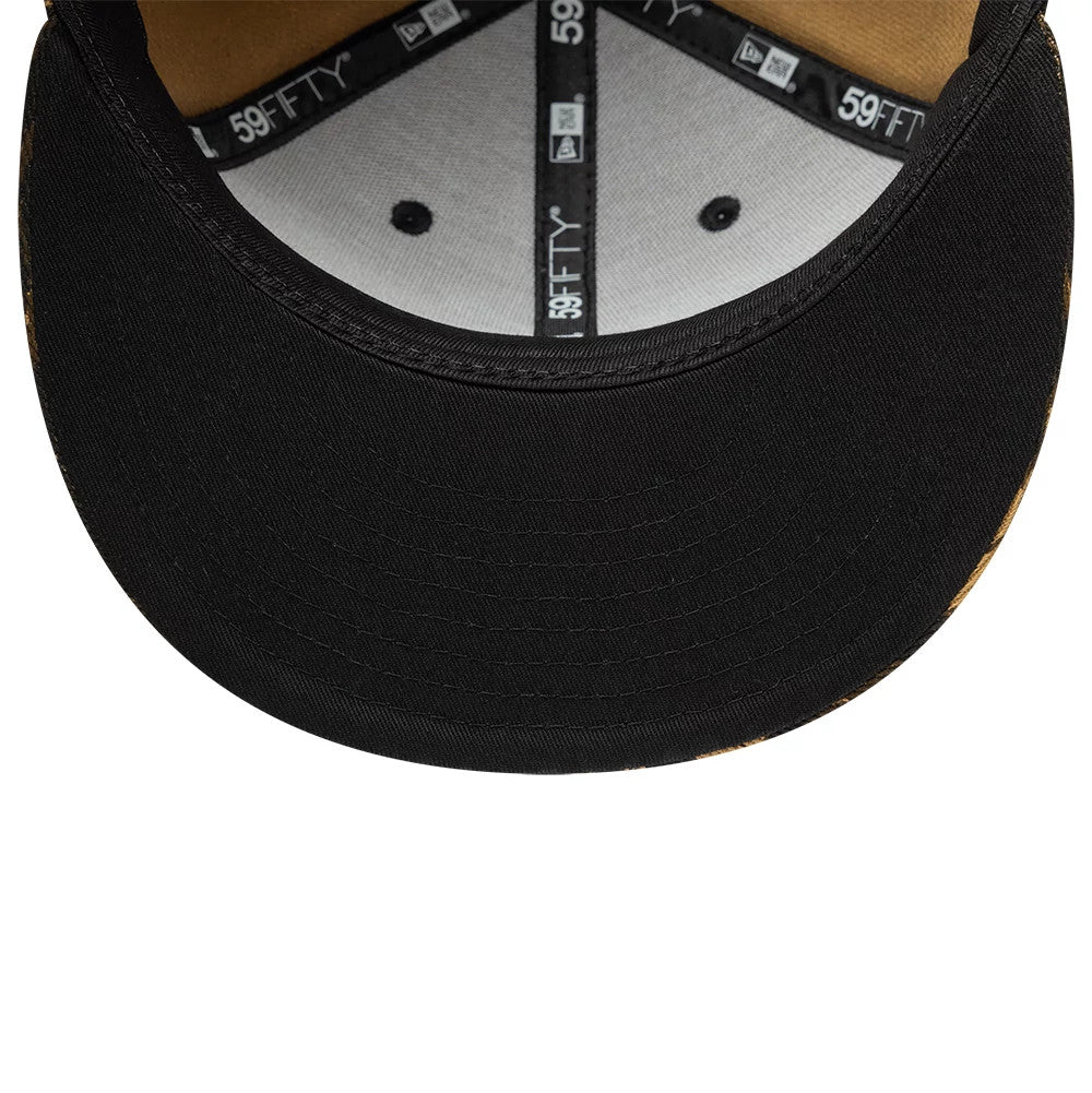 New Era Leopard Black 59FIFTY Fitted Cap, inside view showing black and grey taping with brand logos, a beige sweatband, and a golden brown undervisor, highlighting the detailed stitching under the black flat visor.