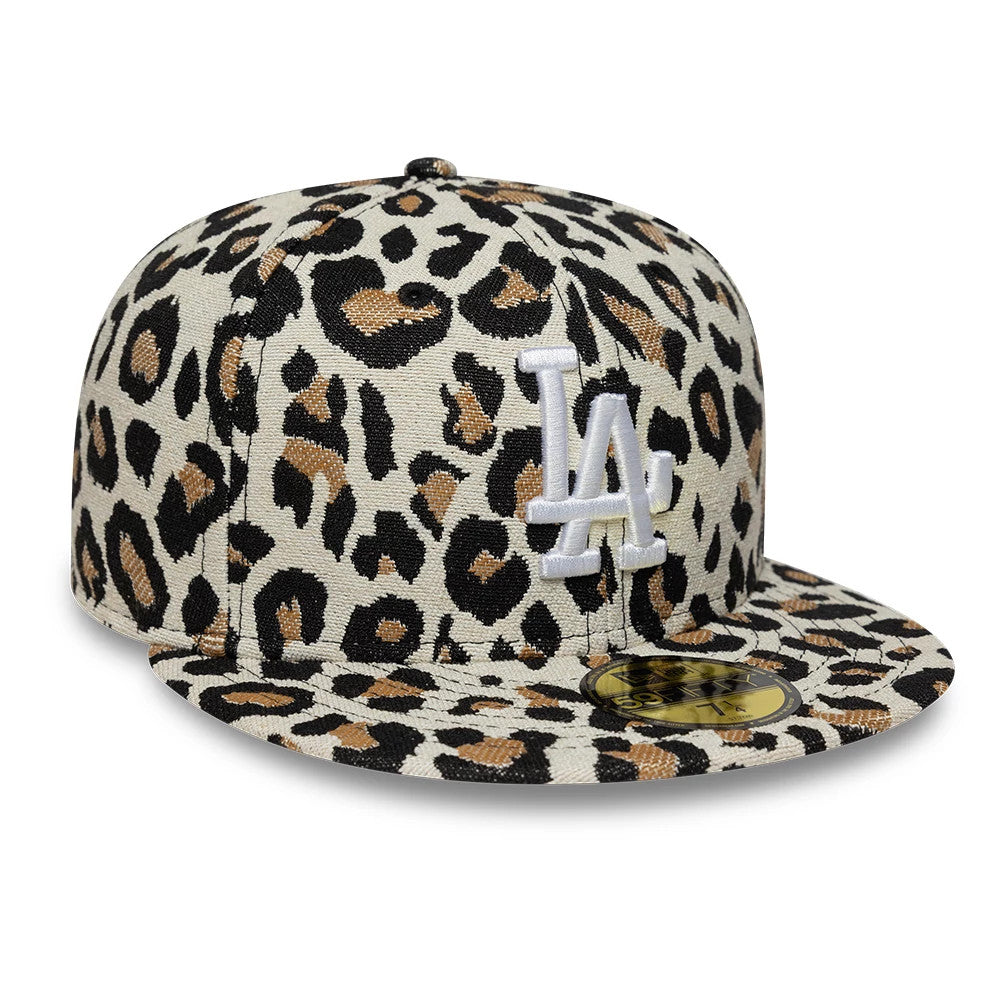 LA Dodgers MLB Leopard Black New Era 59FIFTY Fitted Cap, three-quarter view with a raised white embroidered LA logo on the leopard print front panel, matching flat visor and a gold 59FIFTY size sticker on the visor.