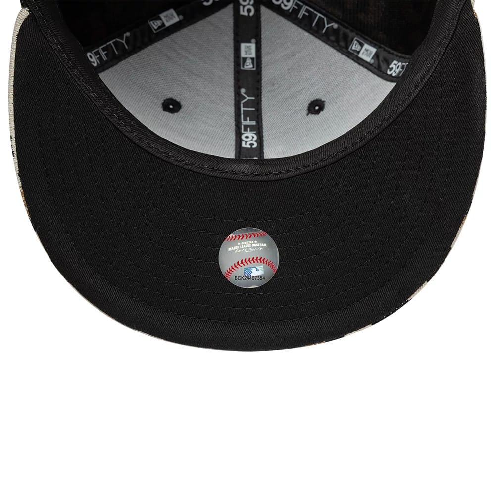 LA Dodgers MLB Leopard Black New Era 59FIFTY Fitted Cap, inside view showing the grey undervisor, the black 59FIFTY taping along the seams, two black eyelets on the light grey sweatband, and a round holographic sticker.