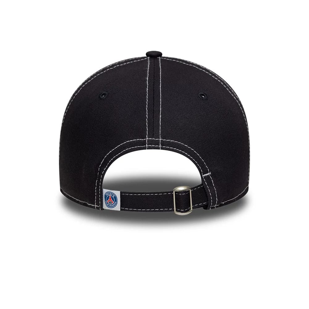 Paris Saint-Germain Pop Stitch Navy New Era 9TWENTY Adjustable Cap, rear view showing a small embroidered club crest on the fabric strap with a buckle, contrast white stitching and eyelets on the navy crown.