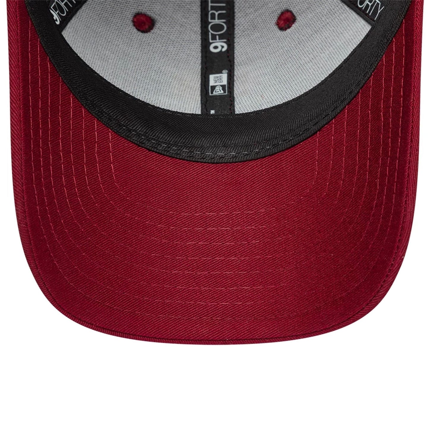 FC Barcelona Youth Core Dark Red New Era 9FORTY Adjustable Cap, inside view showing the black sweatband with New Era branding, red eyelets on the grey fabric lining, and dark red undervisor.