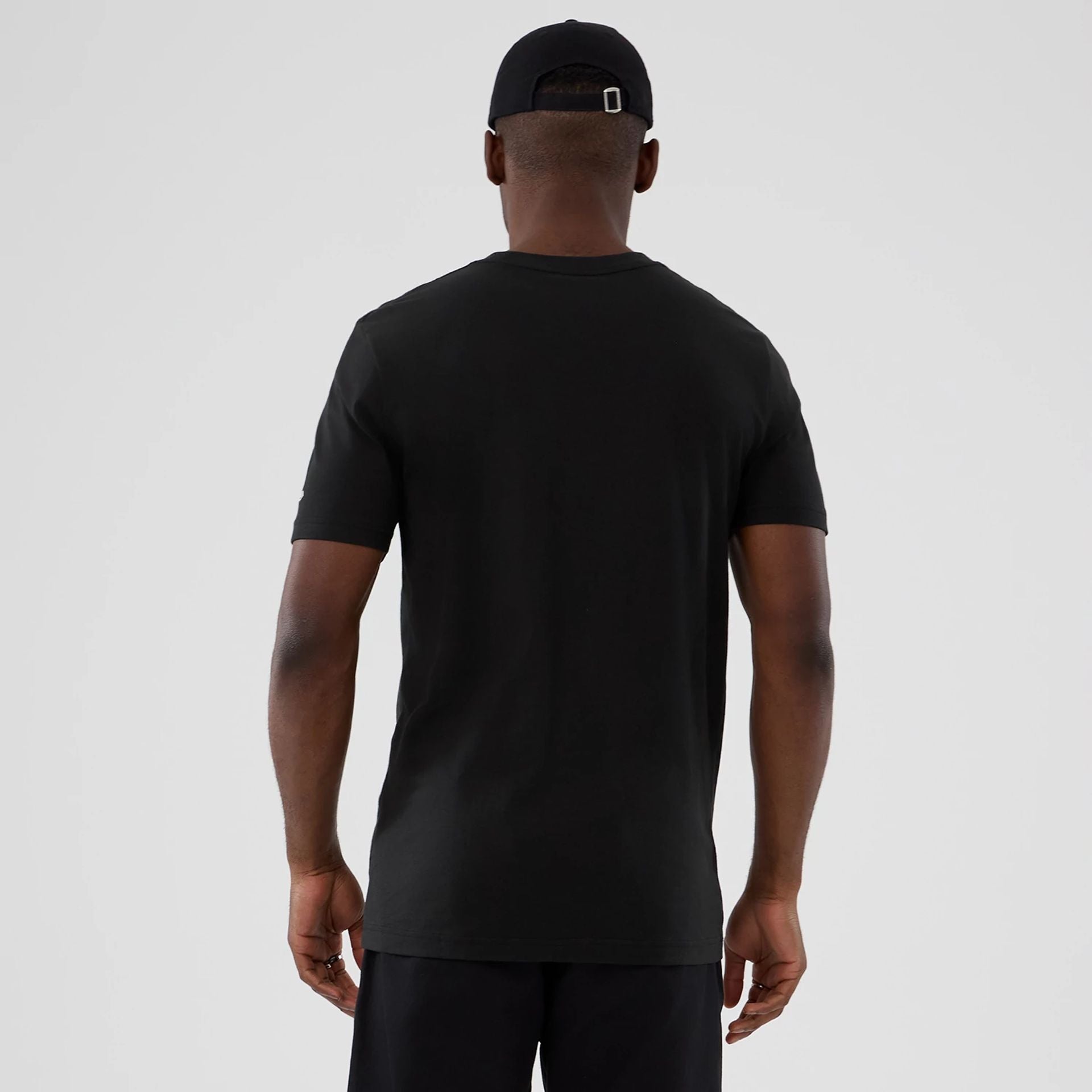 The model is wearing this NBA Hardwood Classic Denver Nuggets T-Shirt in black. 2