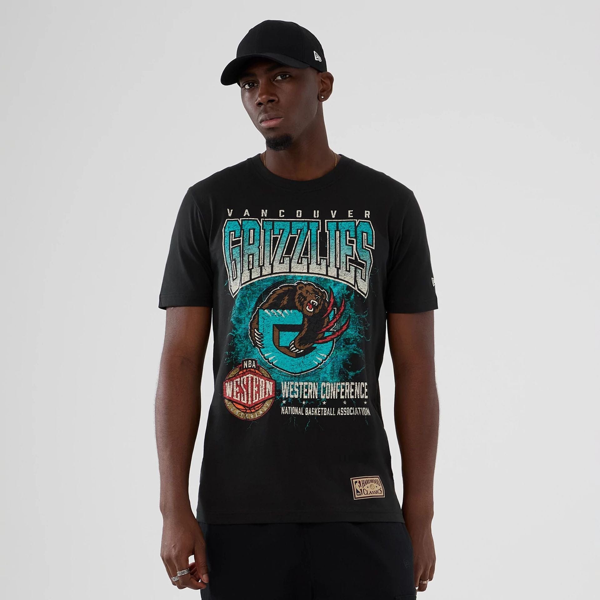 The model is wearing this NBA Hardwood Classic Vancouver Grizzlies T-Shirt in black. 1