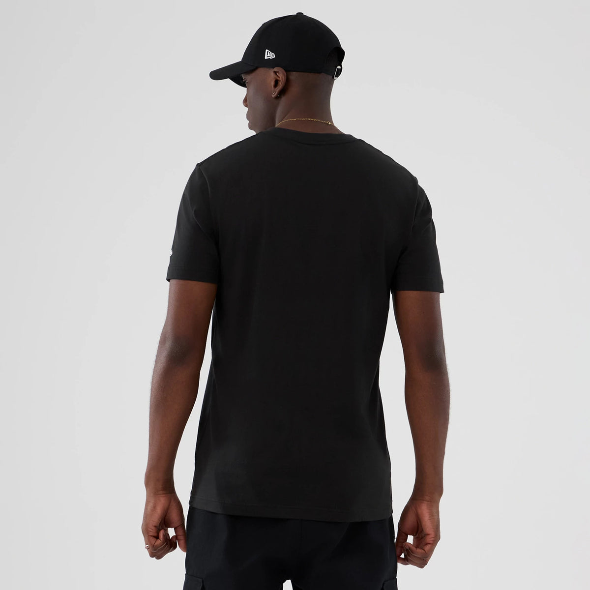 The model is wearing this NBA Hardwood Classic Vancouver Grizzlies T-Shirt in black. 2