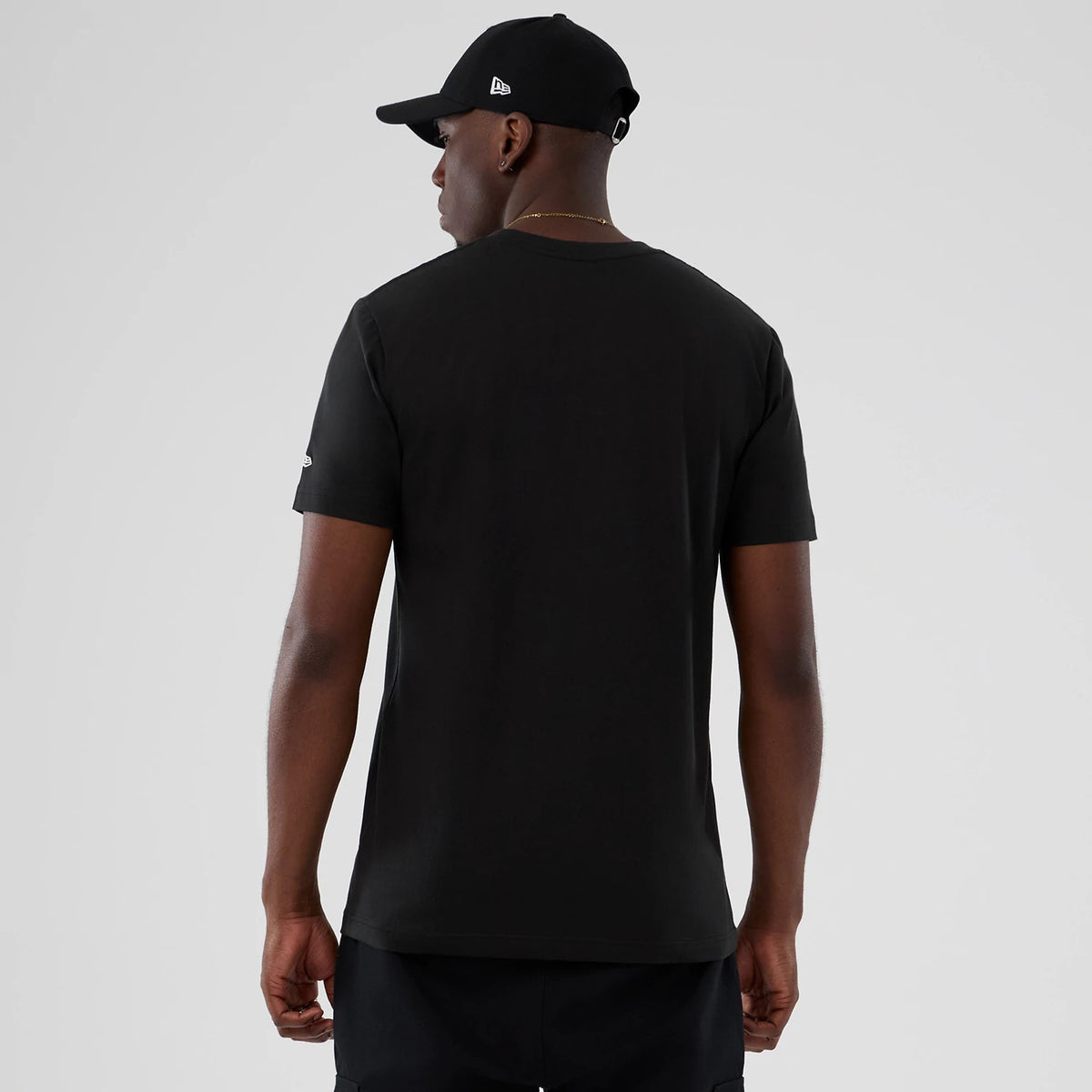 The model is wearing this NBA Hardwood Classic Utah Jazz T-Shirt in black. 2