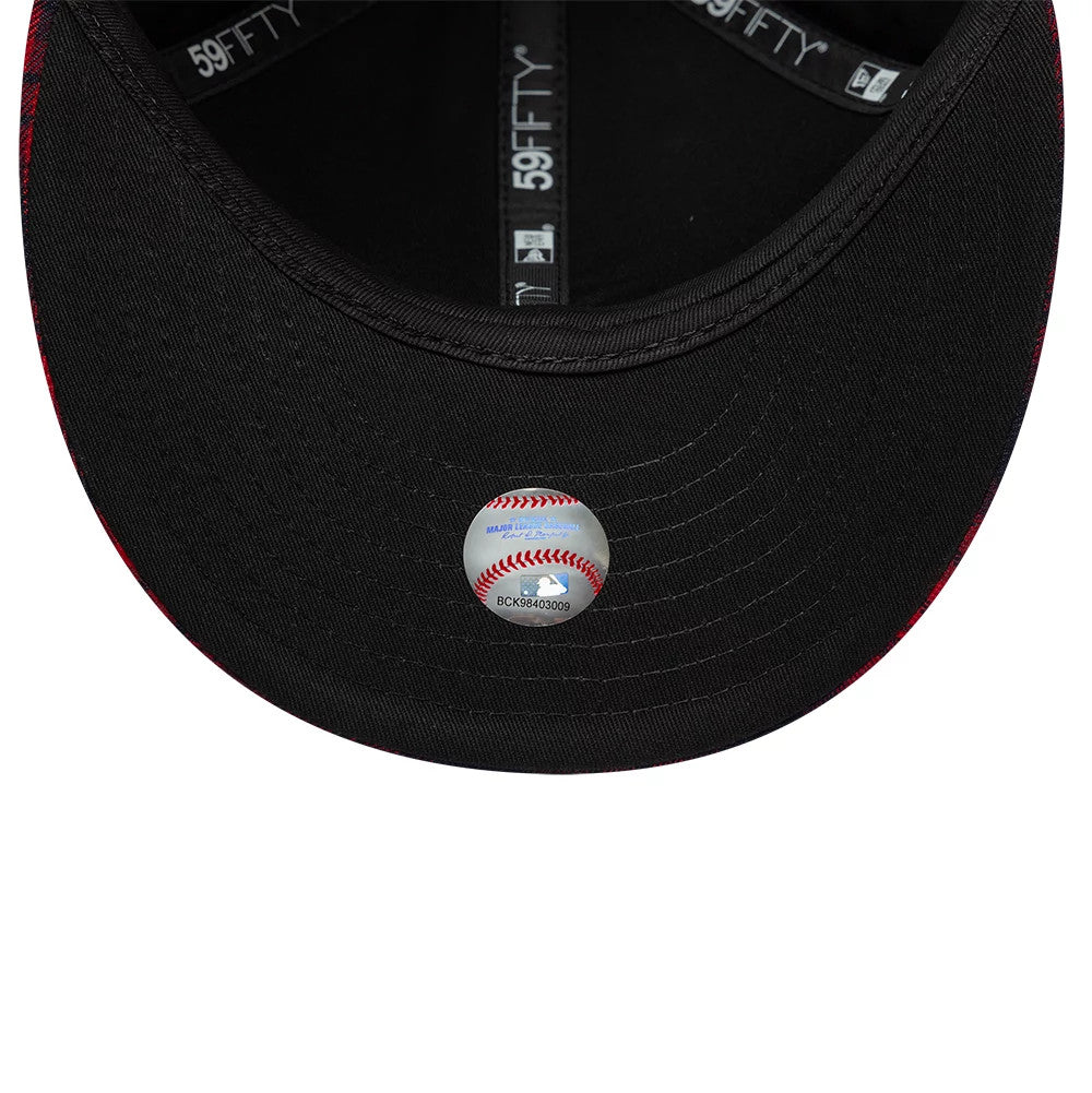 New York Yankees MLB Check Red Low Profile New Era 59FIFTY Fitted Cap, inside view showing black sweatband with 59FIFTY branding, black taping along the seams, and a white Major League Baseball holographic sticker on the black undervisor.