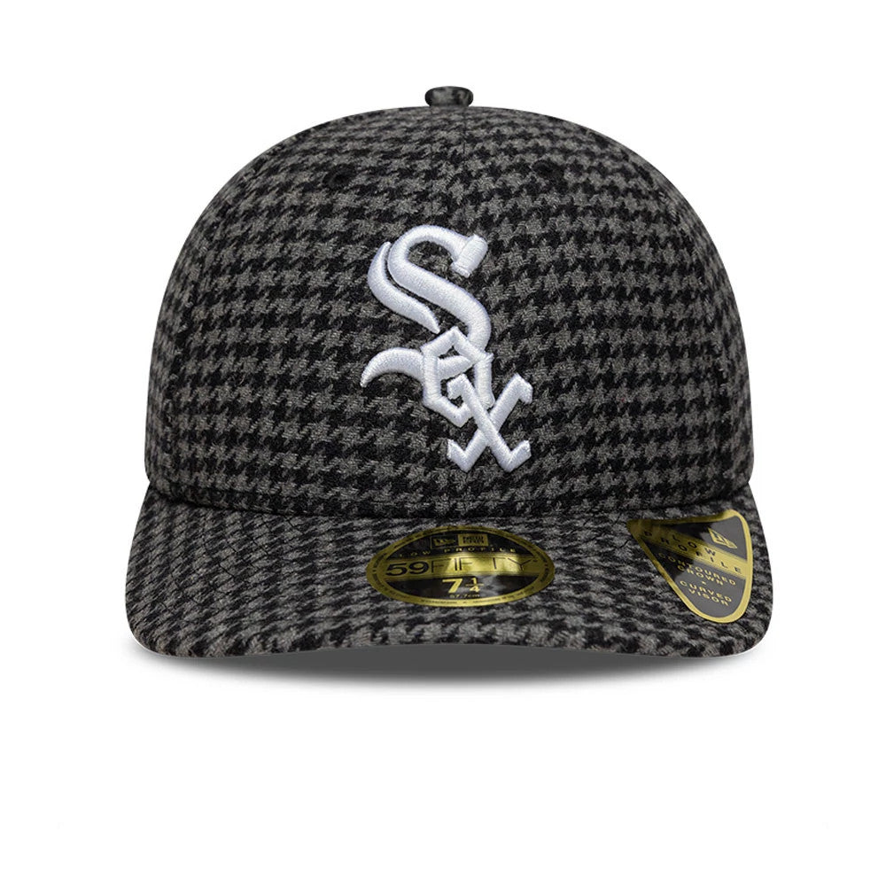 Chicago White Sox MLB Houndstooth Black Low Profile New Era 59FIFTY Fitted Cap, front view showing raised white Sox logo embroidery on the houndstooth crown and visor, with gold 59FIFTY size sticker on the visor.