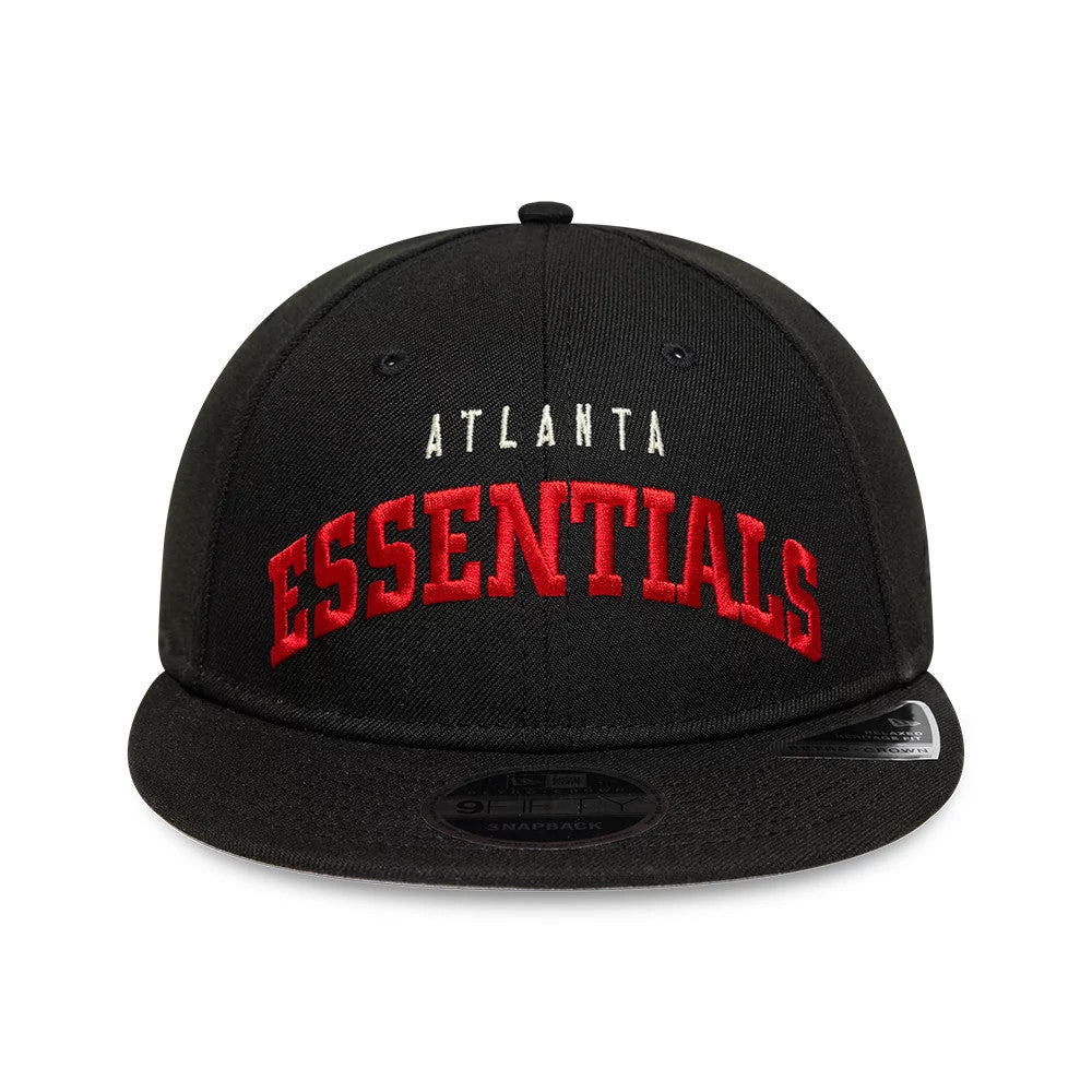 Atlanta Falcons Fear Of God x NFL Black Retro Crown New Era 9FIFTY Adjustable Cap, front view showing raised red Essentials lettering on the black crown, flat black visor, and 9FIFTY size sticker on the undervisor.