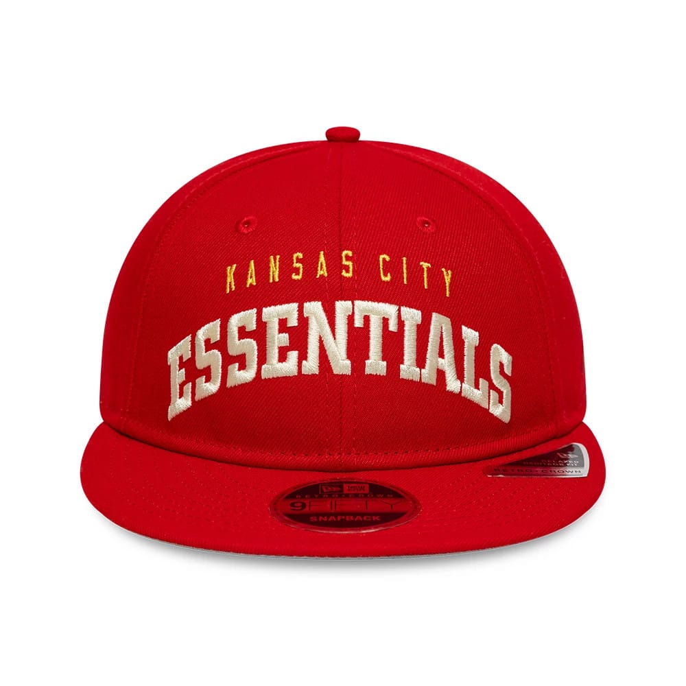 Kansas City Chiefs Fear Of God x NFL Red Retro Crown New Era 9FIFTY Adjustable Cap, front view showing white Essentials embroidery below yellow Kansas City lettering on red crown, with a red visor and 9FIFTY size sticker.