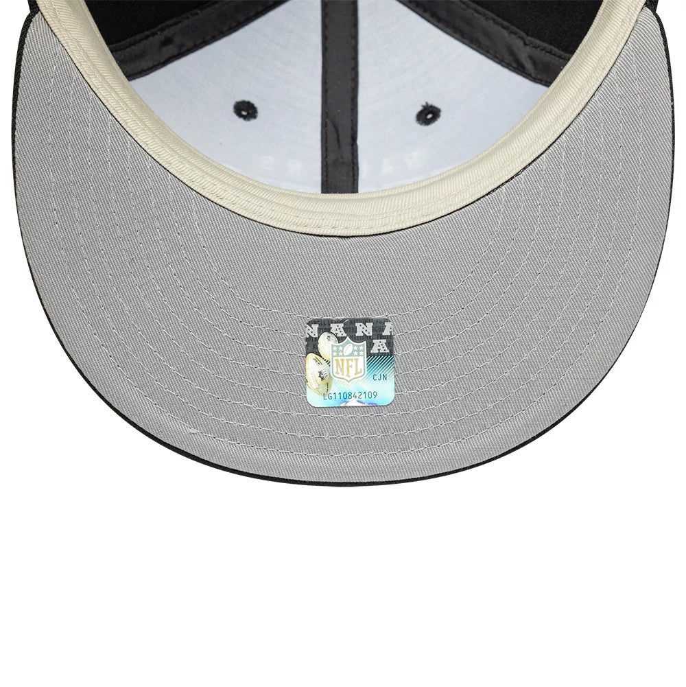 Las Vegas Raiders Fear Of God x NFL Black Retro Crown New Era 9FIFTY Adjustable Cap, inside view showing the grey undervisor with a centred NFL authenticity sticker, black sweatband and white taping with team branding.