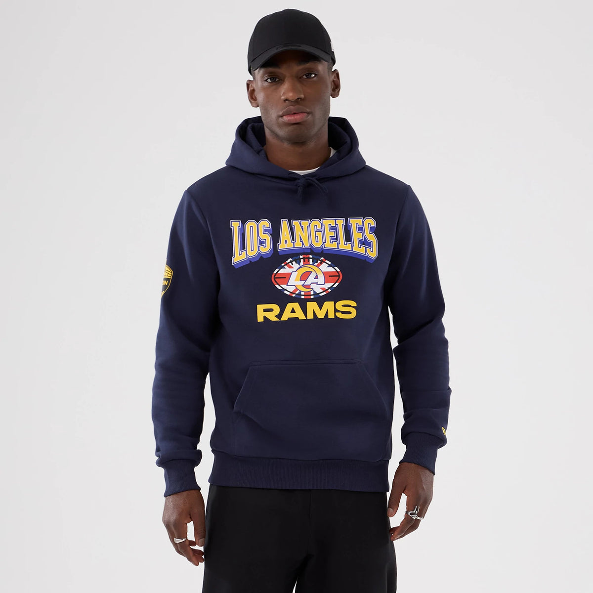 The Male model is wearing LA Rams NFL International Series Games 2025 Navy Pullover Hoodie 1