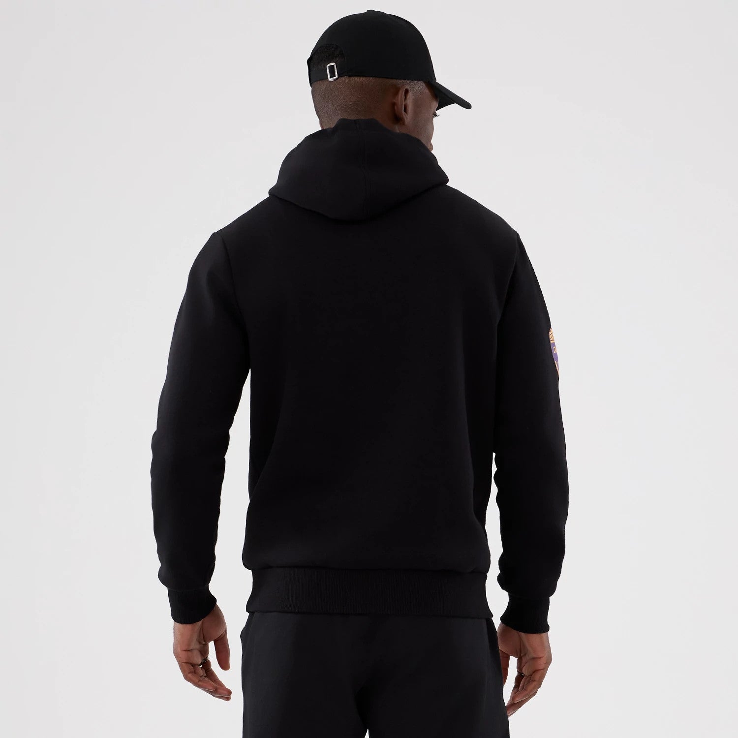 The Male model is wearing Minnesota Vikings NFL International Series Games 2025 Black Pullover Hoodie 2