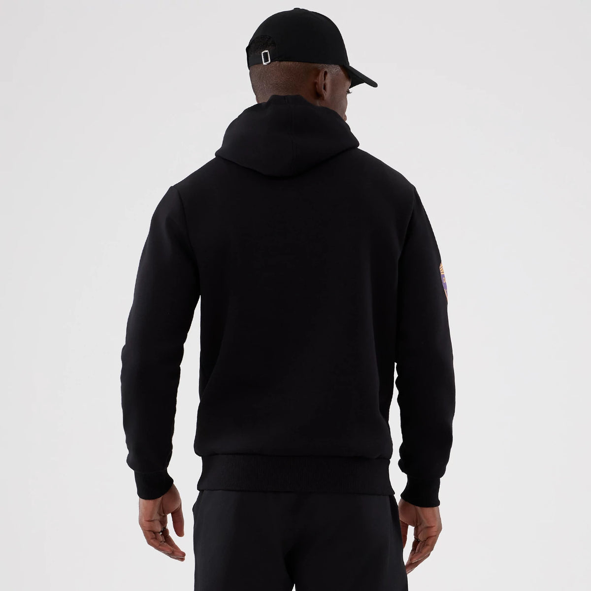 The Male model is wearing Minnesota Vikings NFL International Series Games 2025 Black Pullover Hoodie 2