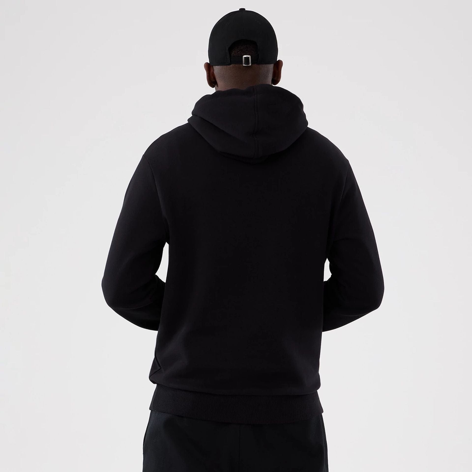 The Male model is wearing Washington Commanders NFL International Series Games 2025 Black Pullover Hoodie 2