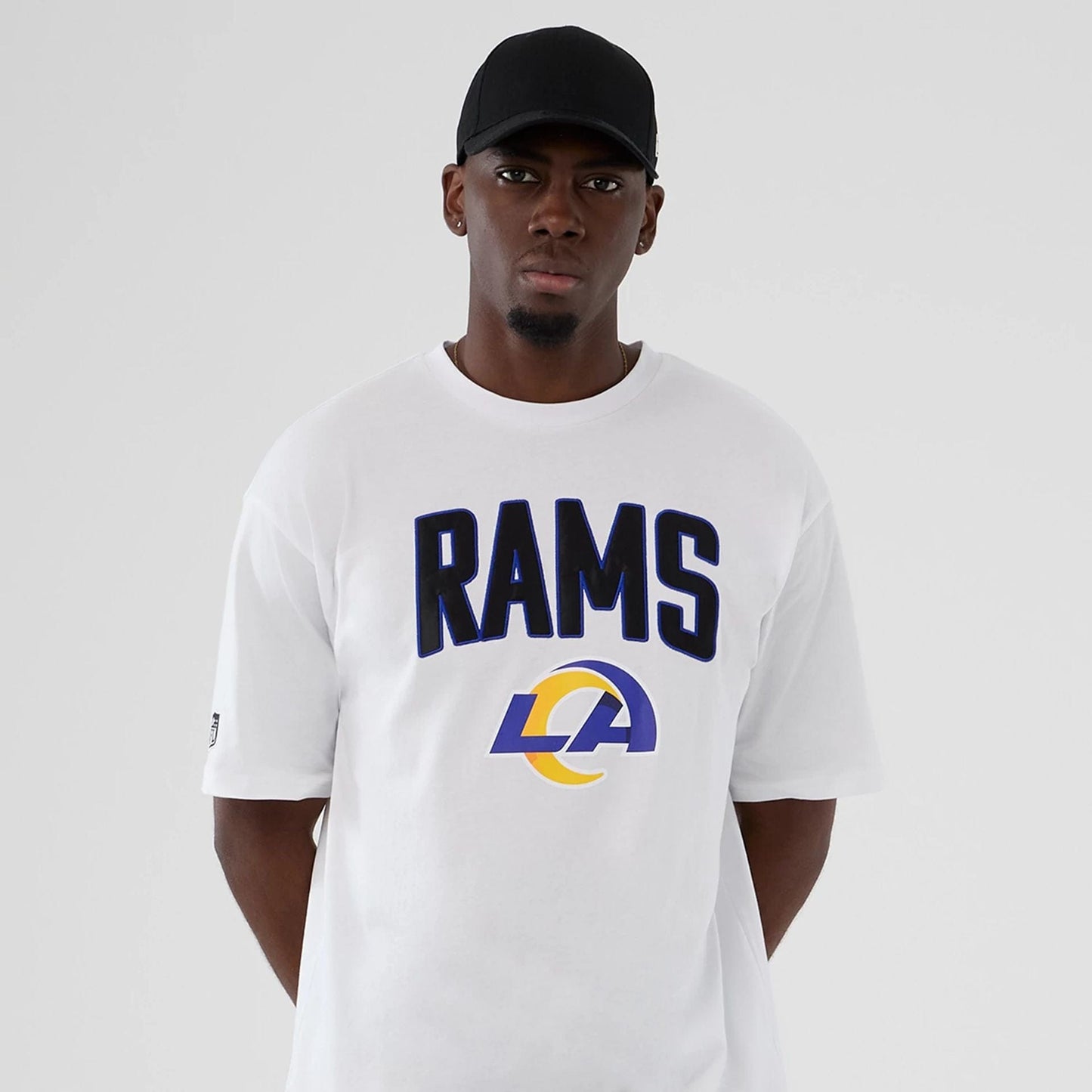 The Male model is wearing LA Rams NFL International Series Games 2025 White Premium T-Shirt 7