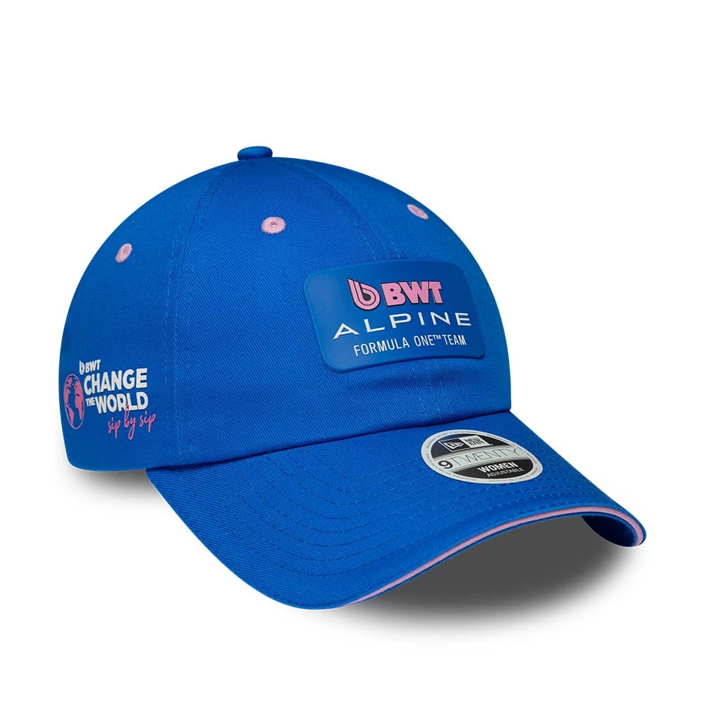 Alpine Racing Womens Team Blue New Era Pony Tail Cap, front view showing a blue crown with a pink BWT Alpine Formula One Team patch on the front panel, and a 9FORTY size sticker on the curved visor.