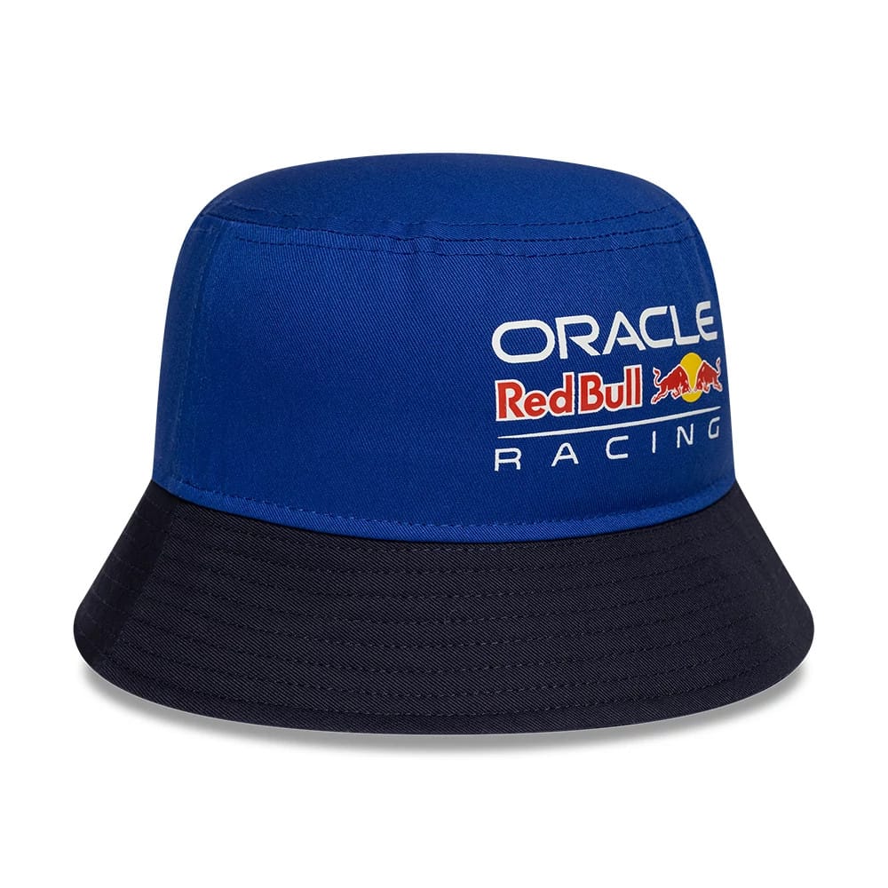 New Era Red Bull Racing Youth Essential Dark Blue Bucket Hat, three-quarter view showing the Oracle Red Bull Racing logo in white and red embroidery on the structured dark blue crown, with a contrasting black visor.