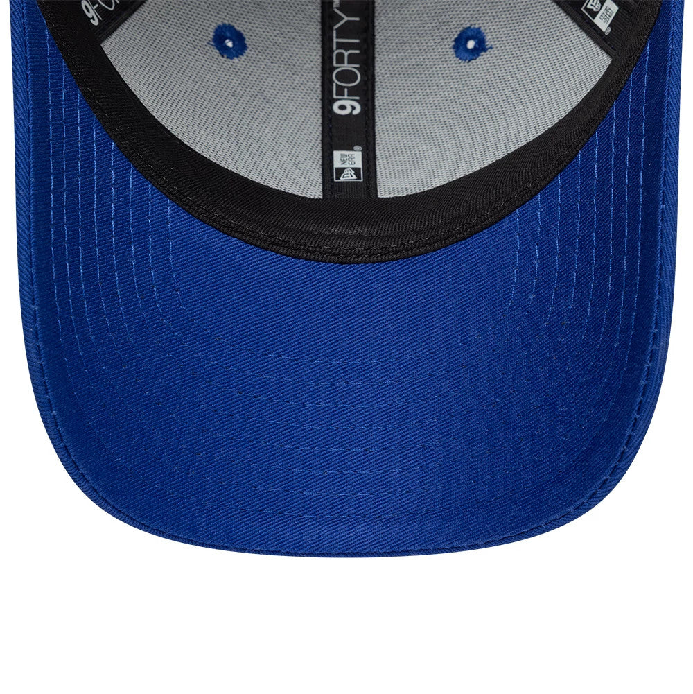 Red Bull Racing Youth Essential Dark Blue New Era 9FORTY Adjustable Cap, inside view showing the grey undervisor, black sweatband, and branded taping, with blue front eyelets contrasting against the dark blue fabric.