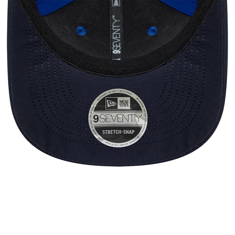 Red Bull Racing Youth Max Verstappen Dark Blue New Era 9SEVENTY Stretch Snap Adjustable Cap, inside view showing a silver 9SEVENTY Stretch-Snap size sticker on the dark blue visor and black sweatband with the New Era logo on the taping.