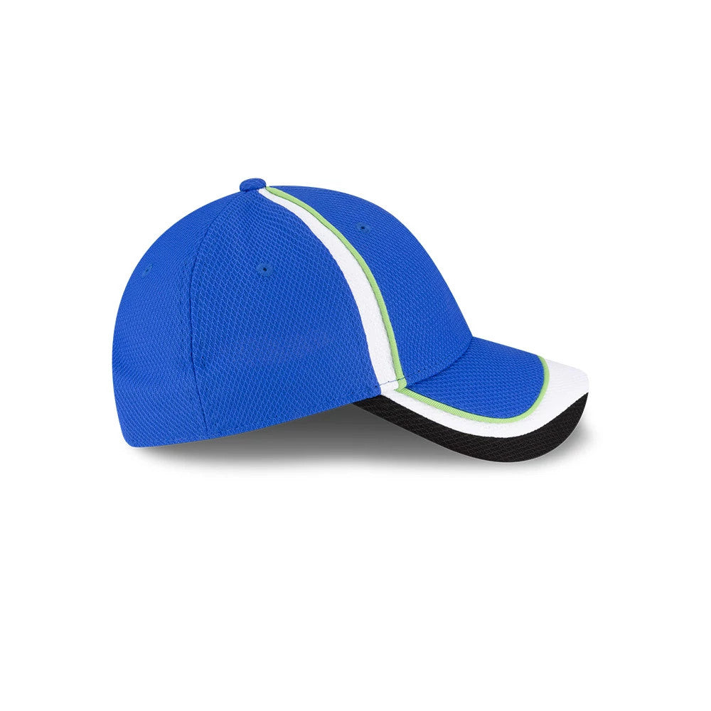 Visa Cash App Racing Bulls Team Bright Blue New Era 9FORTY Adjustable Cap, side view showing a bright blue mesh fabric with contrasting white and green stripes, a curved black and white visor, and embroidered eyelets on the crown.