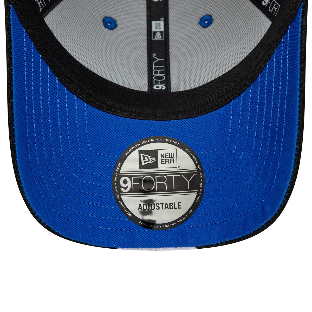Visa Cash App Racing Bulls Teamline 2026 Blue New Era 9FORTY Adjustable Cap, inside view showing the grey sweatband, black taping with white 9FORTY lettering, blue embroidered eyelets, and 9FORTY size sticker on the blue undervisor.