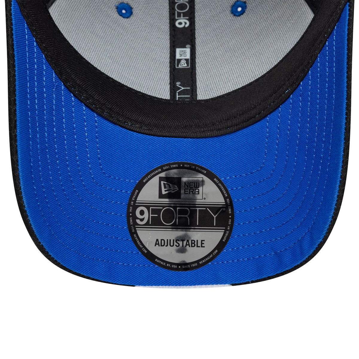 Visa Cash App Racing Bulls Teamline 2026 Blue New Era 9FORTY Adjustable Cap, inside view showing light grey internal panels, black taping with repeating branding, blue eyelets, and a large black and silver 9FORTY size sticker on the blue undervisor.
