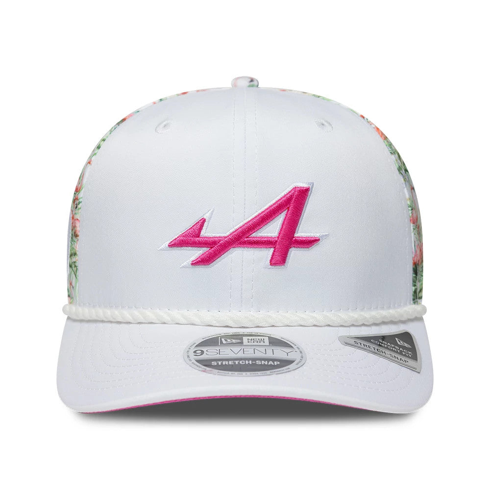 Alpine Racing Miami Race Special White New Era 9SEVENTY Stretch Snap Adjustable Cap, front view showing a raised pink A logo embroidered on the structured white crown, white braided rope, floral side panels and 9SEVENTY size sticker on the visor.