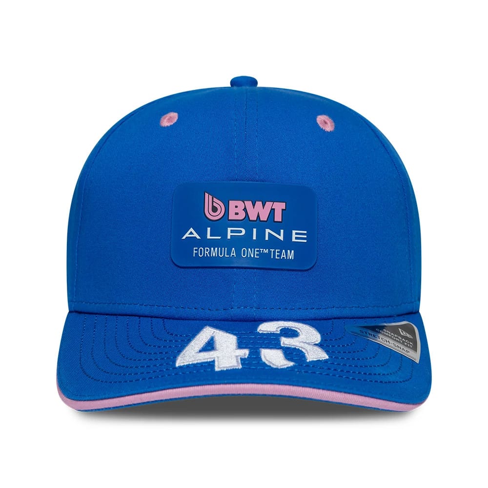 Alpine Racing Franco Colapinto Blue New Era 9SEVENTY Stretch Snap Adjustable Cap, front view showing the raised pink and white BWT Alpine Formula One Team logo on the crown and the large white number 43 embroidered on the blue visor.