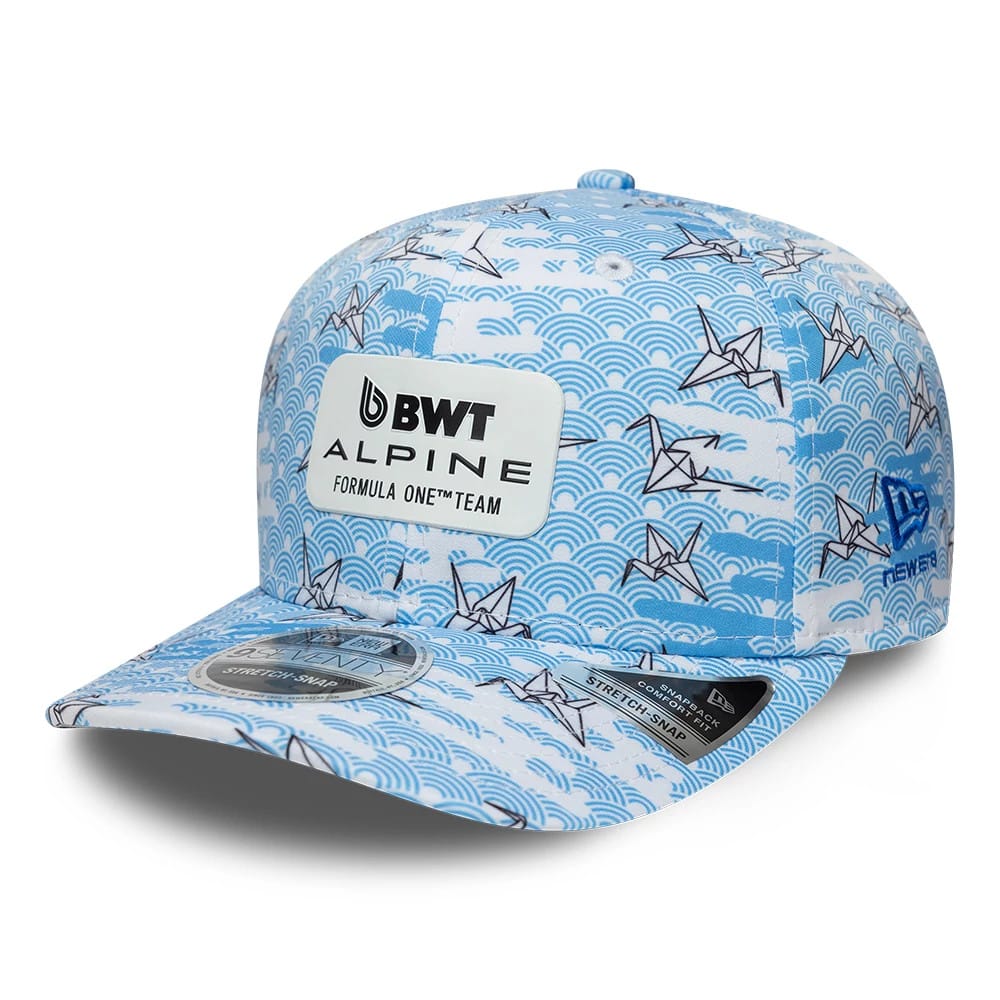 Alpine Racing Japan Race Special White New Era 9SEVENTY Stretch Snap Adjustable Cap, front view showing the BWT Alpine Formula One Team logo on the front panel, intricate blue wave and crane pattern.