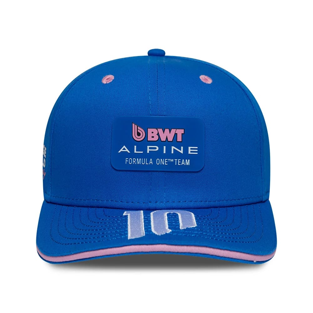Alpine Racing Pierre Gasly Blue New Era 9SEVENTY Stretch Snap Adjustable Cap, front view showing a raised BWT Alpine Formula One Team graphic on the structured blue crown, with pink and white details, and number 10 embroidered on the visor.