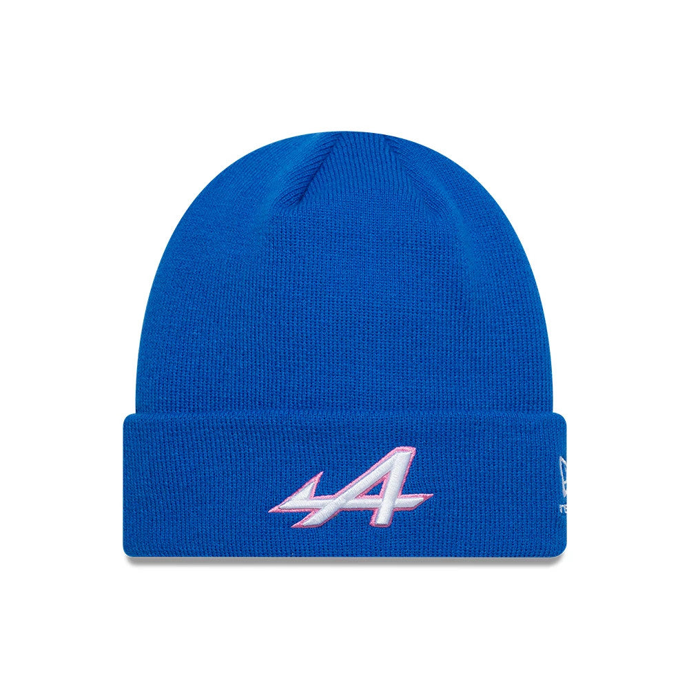 New Era Alpine Racing Essential Blue Cuff Knit Beanie Hat, front view with white and pink embroidered Alpine A logo on the cuff and the New Era flag logo on the side of the bright blue knit fabric.