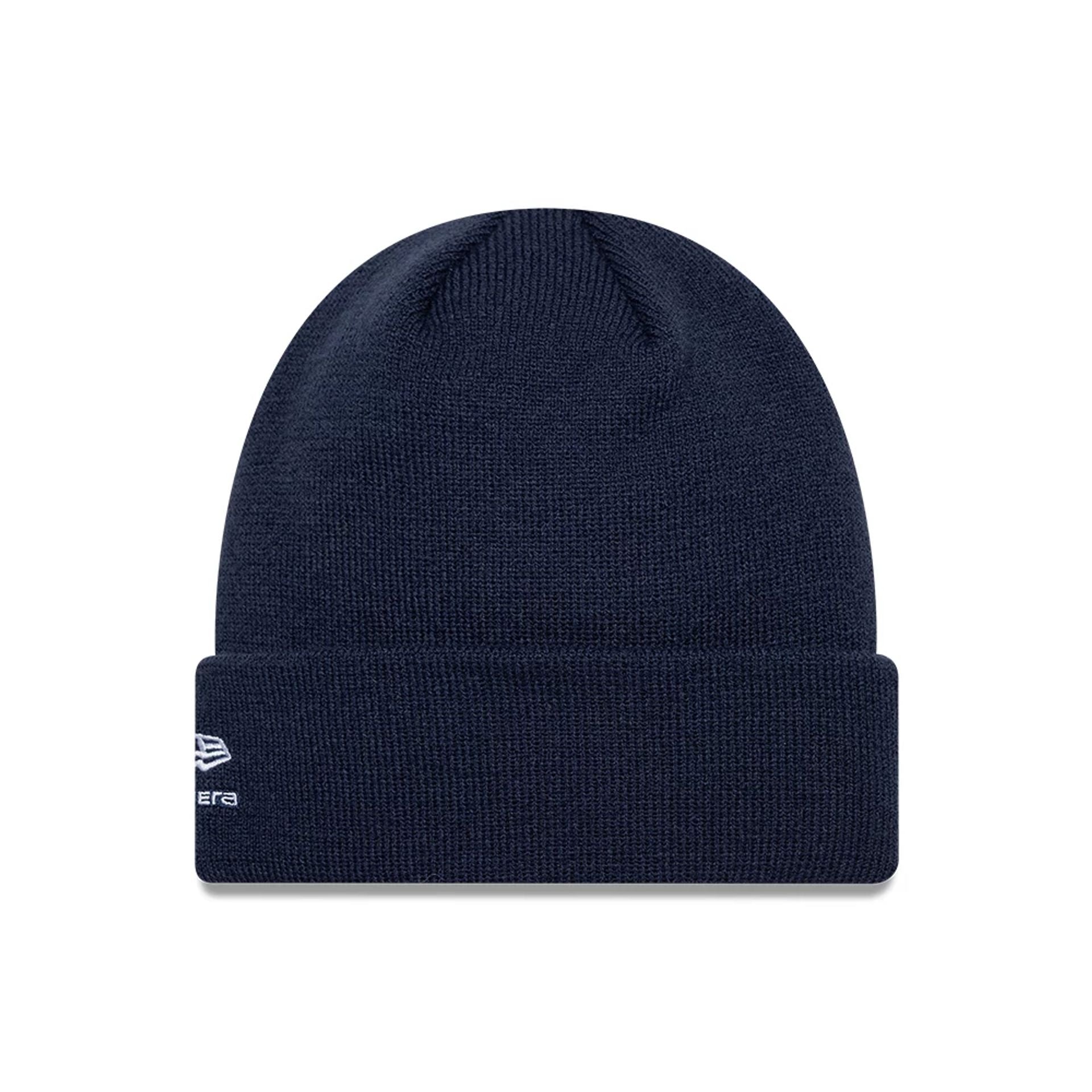 Pictured is this Essential Alpine Racing Cuff Knit Beanie hat in dark blue. 2