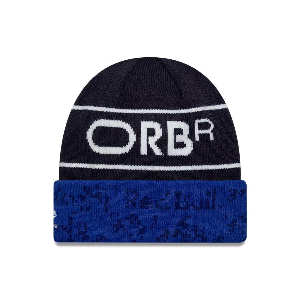 New Era Red Bull Racing Team Dark Blue Cuff Knit Beanie Hat, front view showing the white ORBR lettering across the dark blue knit crown above the vivid blue cuff with New Era flag logo embroidered on the side.