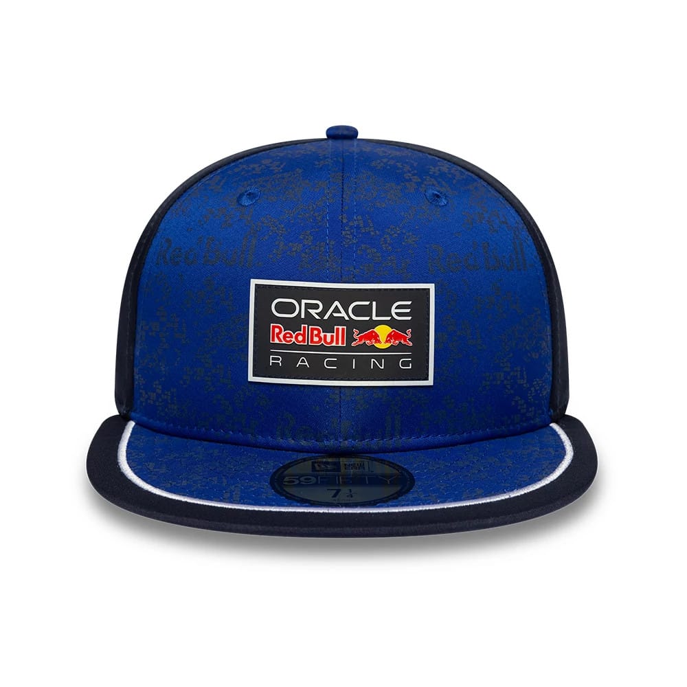 Red Bull Racing Dark Blue New Era 59FIFTY Fitted Cap, front view featuring a prominent Red Bull Racing patch with embroidered details on the centre front panel, navy flat visor with white piping, and a 59FIFTY size sticker.