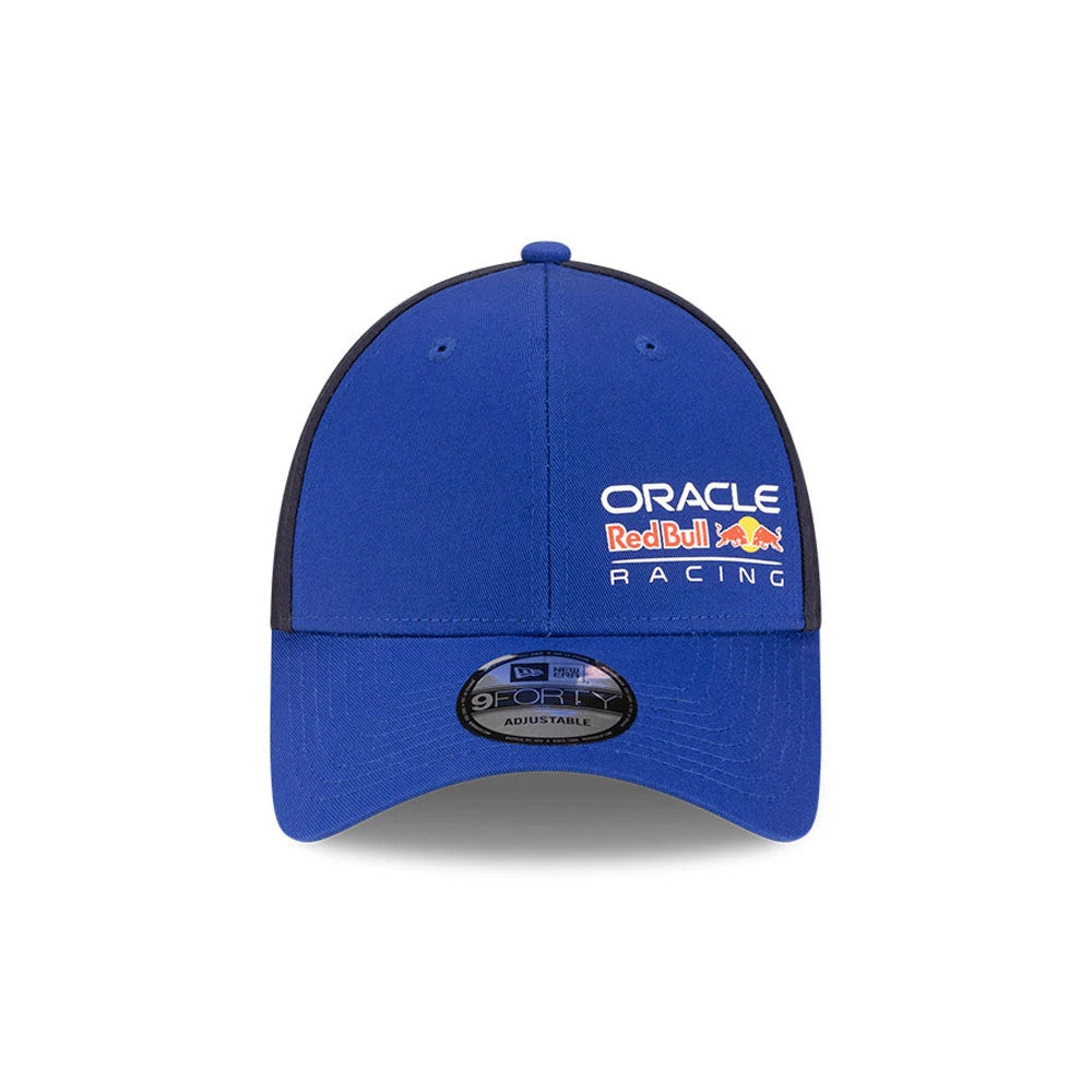 Red Bull Racing Essential Dark Blue New Era 9FORTY Adjustable Cap, front view showing Oracle and Red Bull embroidered logos on the right front panel, with a dark blue curved visor and a 9FORTY size sticker centred.