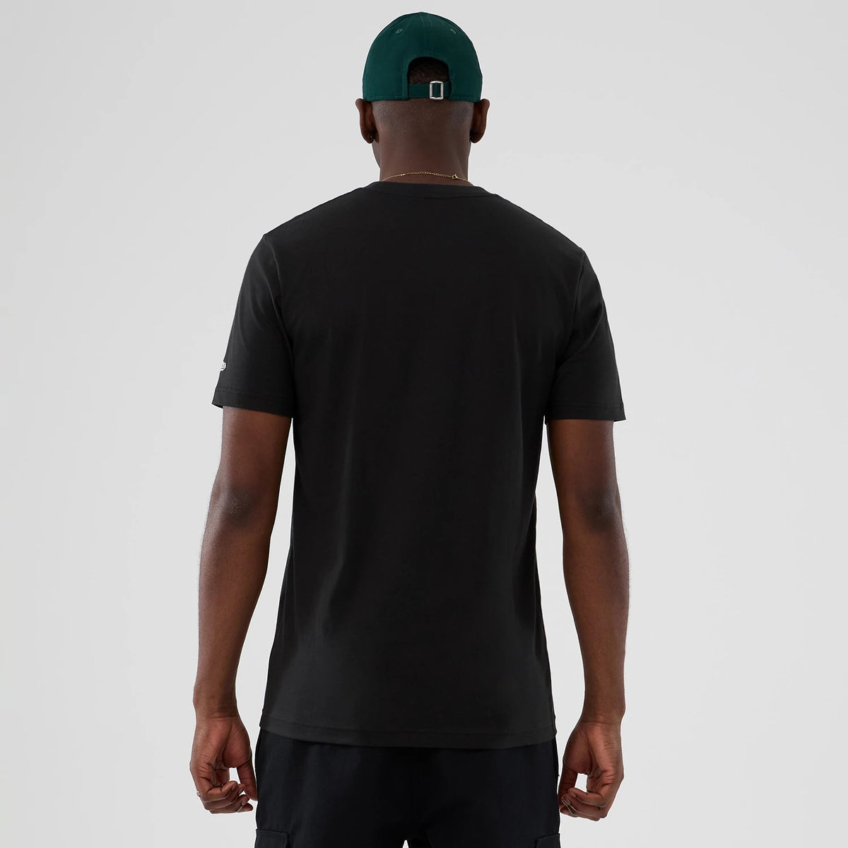 The model is wearing this NBA Hardwood Classic Seattle Supersonics T-Shirt in black. 2