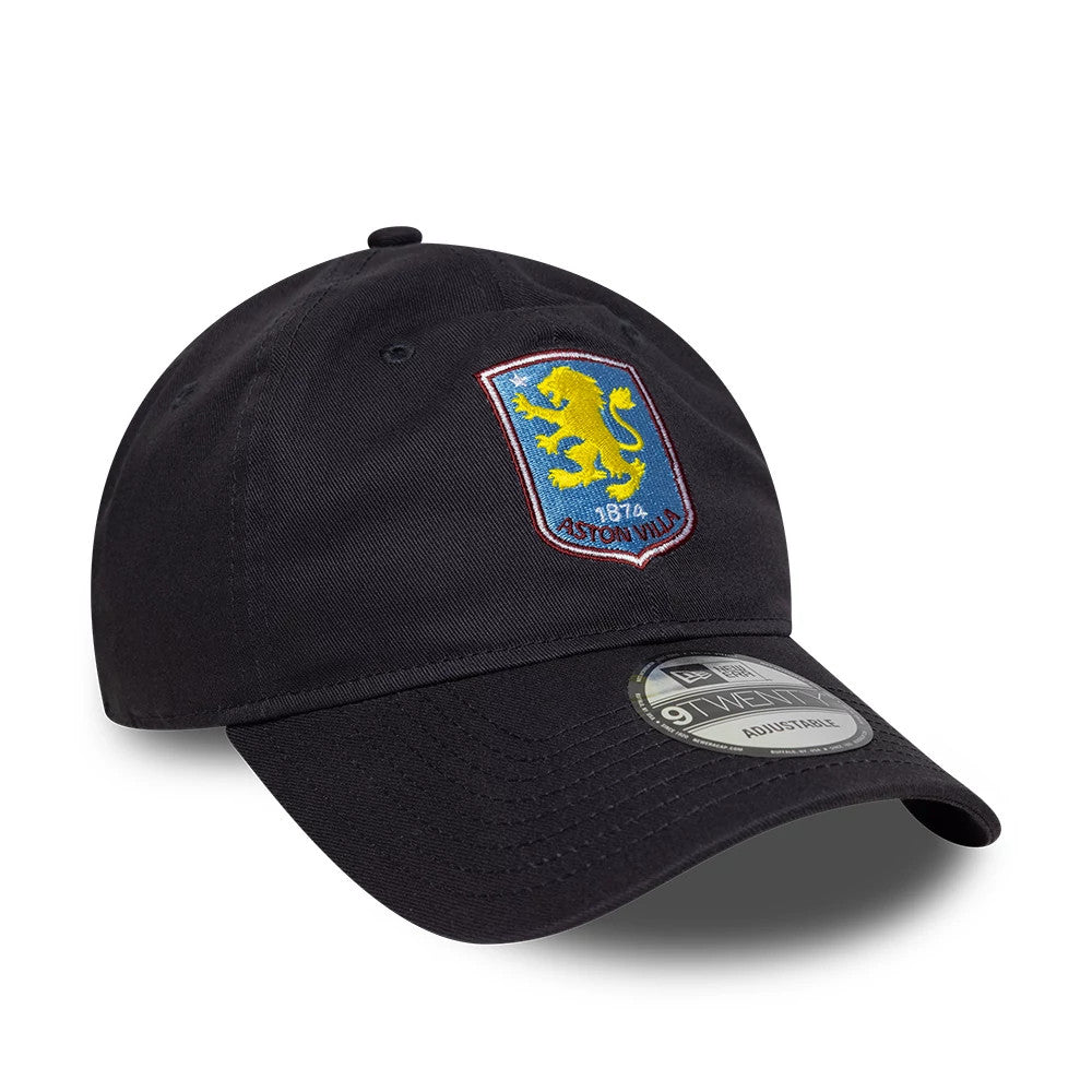 Aston Villa FC Core Navy New Era 9TWENTY Cap, three-quarter view showing the yellow and blue Aston Villa crest with embroidered details on the front panel, navy curved visor and a 9TWENTY size sticker.